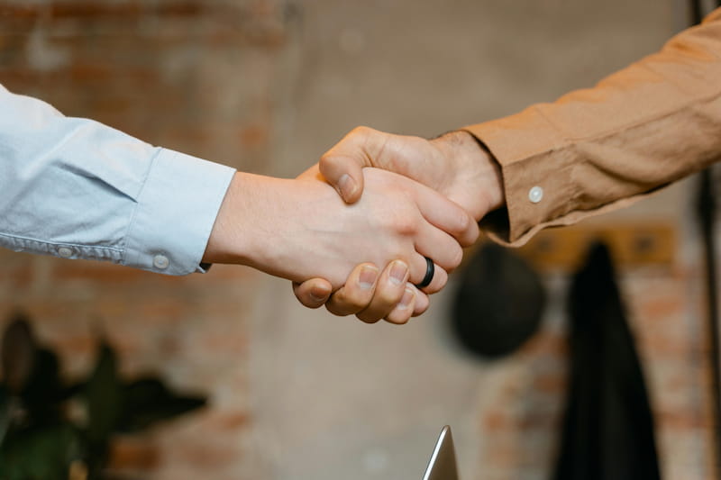 business deal hand shake
